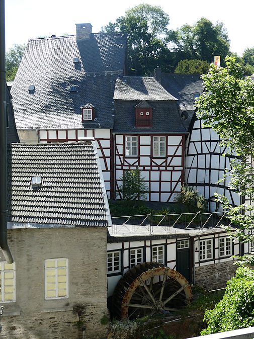 Schmitzenhof with its watermill on the Rur & half-timbered houses