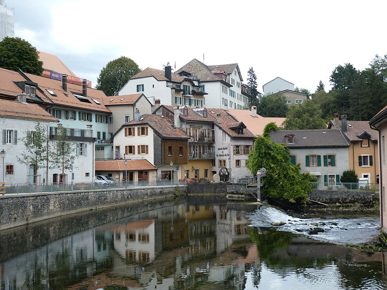 View from the bridge on river Orbe at the end of Rue de Pontarlier